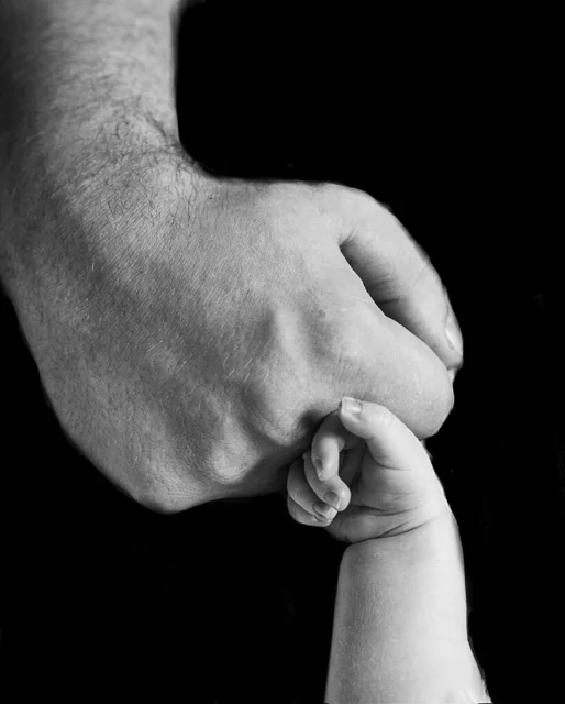 Newborn fist bump detail